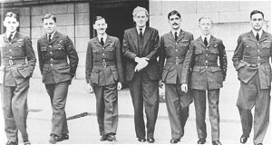 Survivors of the Augsburg raid, left to right, Sqn Ldr D J Penman, Sgt D N Huntley, P/O D Sands, Brendan Bracken (Minister of Information), Flt Lt B R W 'Darky' Hallowes, Sgt R P Irons and Sqn Ldr J D Nettleton